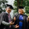 Three graduates
